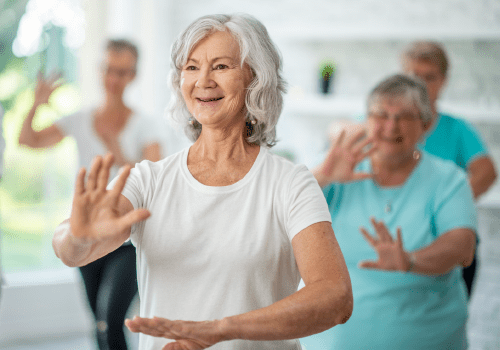 seniors participating in a  tai chi class